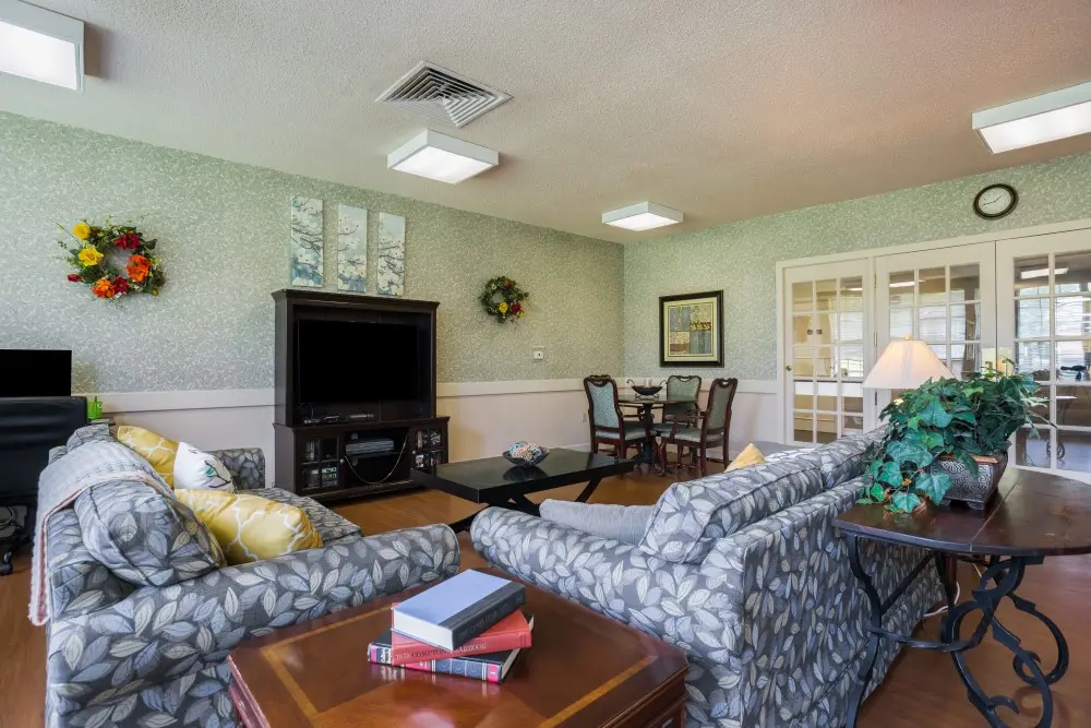 Lobby with television at American House Murfreesboro, an assisted living facility in Murfreesboro, Tennessee